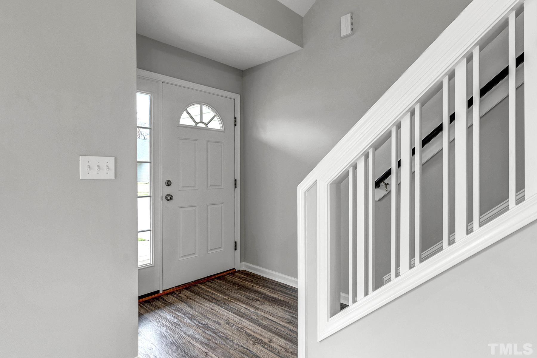 820 Nightshade Way Raleigh, NC 27610 - Photo 11 of 32 a view of an entryway with wooden floor