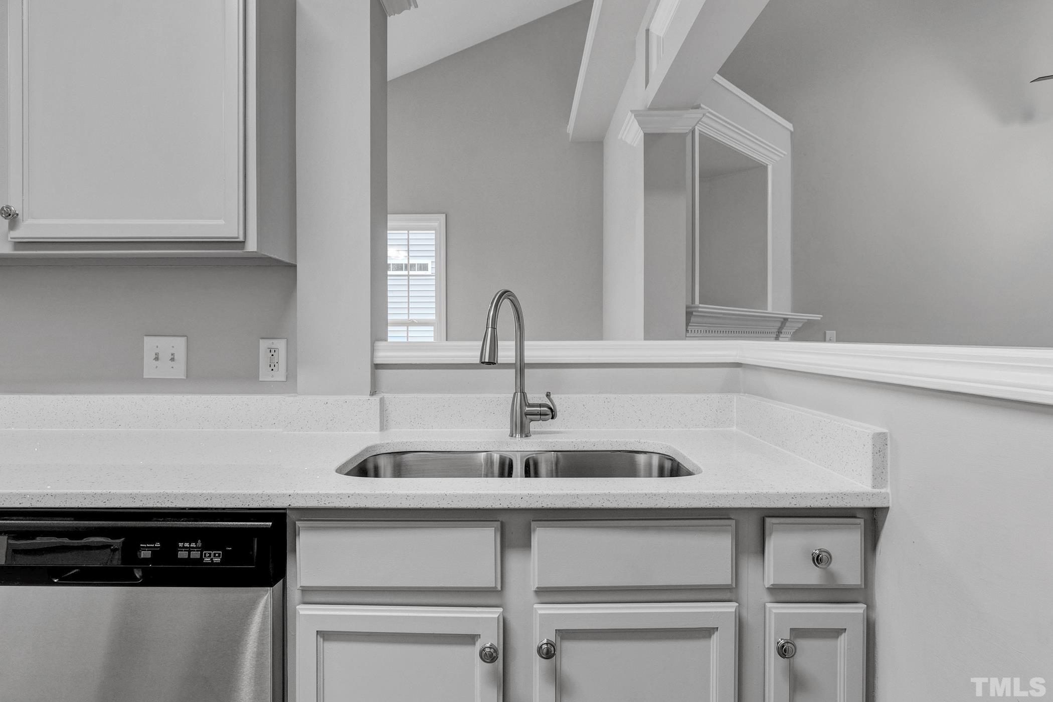 820 Nightshade Way Raleigh, NC 27610 - Photo 18 of 32 a kitchen with a sink and cabinets