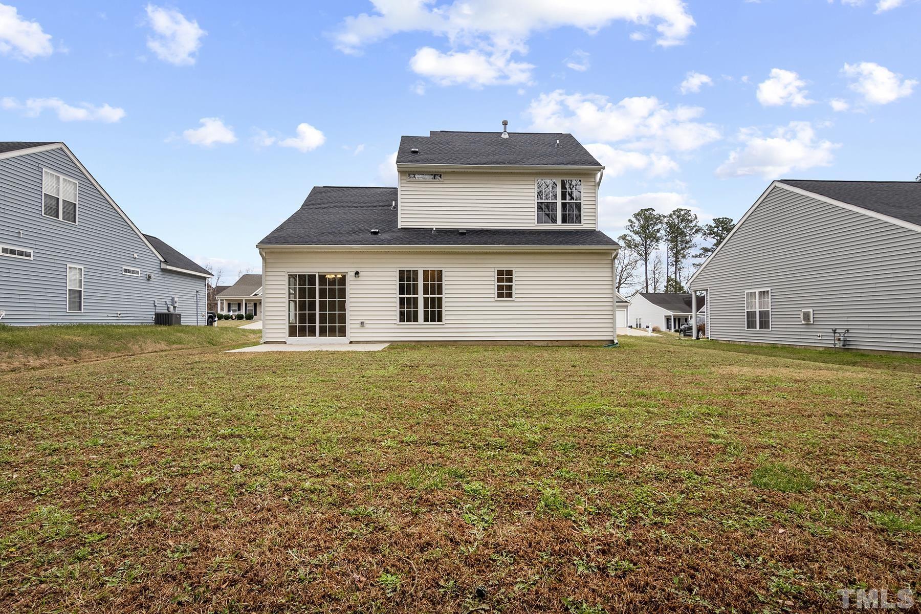 820 Nightshade Way Raleigh, NC 27610 - Photo 32 of 32 a view of a house with a yard