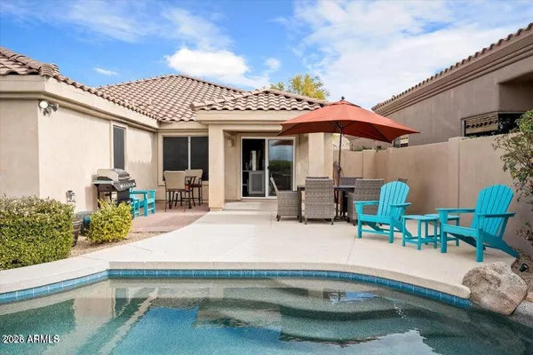 a view of a house with porch patio and furniture