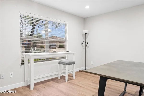 a workspace with furniture and window