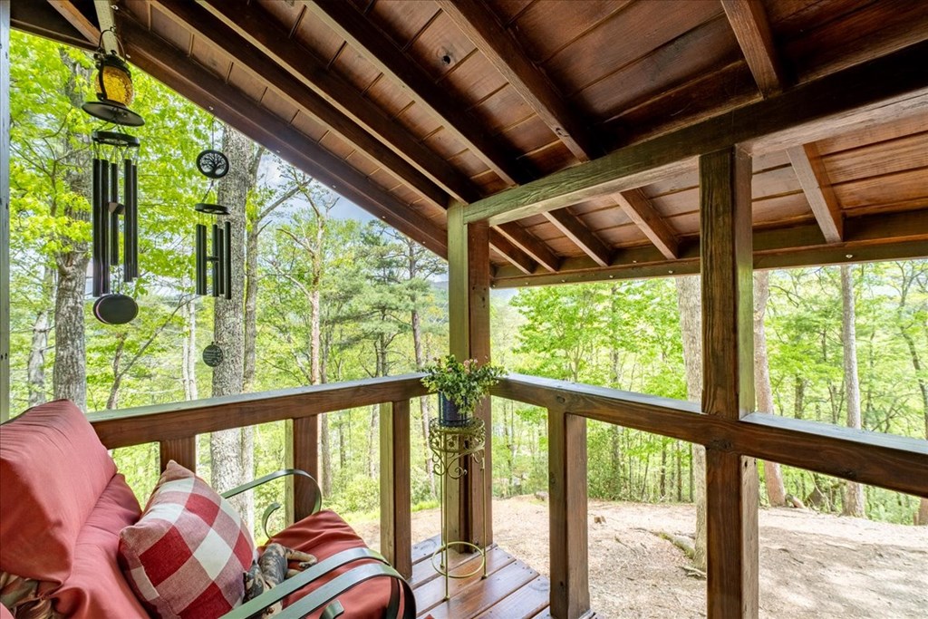 90 Mountain View Trail Blue Ridge, GA 30513 - Photo 31 of 43 a view of a porch with furniture and garden