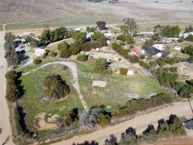 27640 Smith Road Winchester, CA 92596 - Photo 5 of 6 a view of a lot of trees in a yard