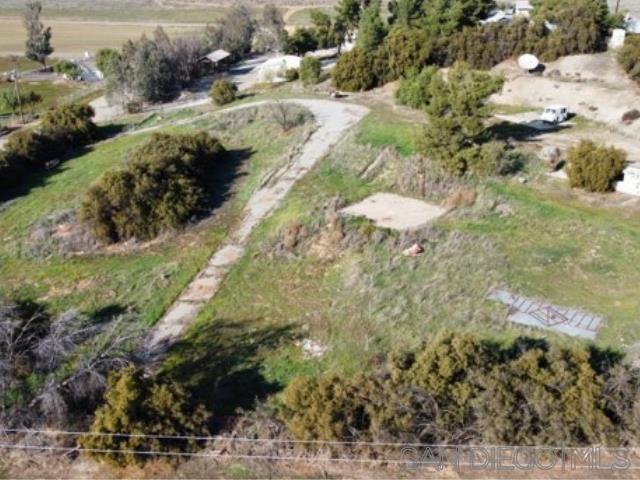 27640 Smith Road Winchester, CA 92596 - Photo 6 of 6 a view of a street with a yard