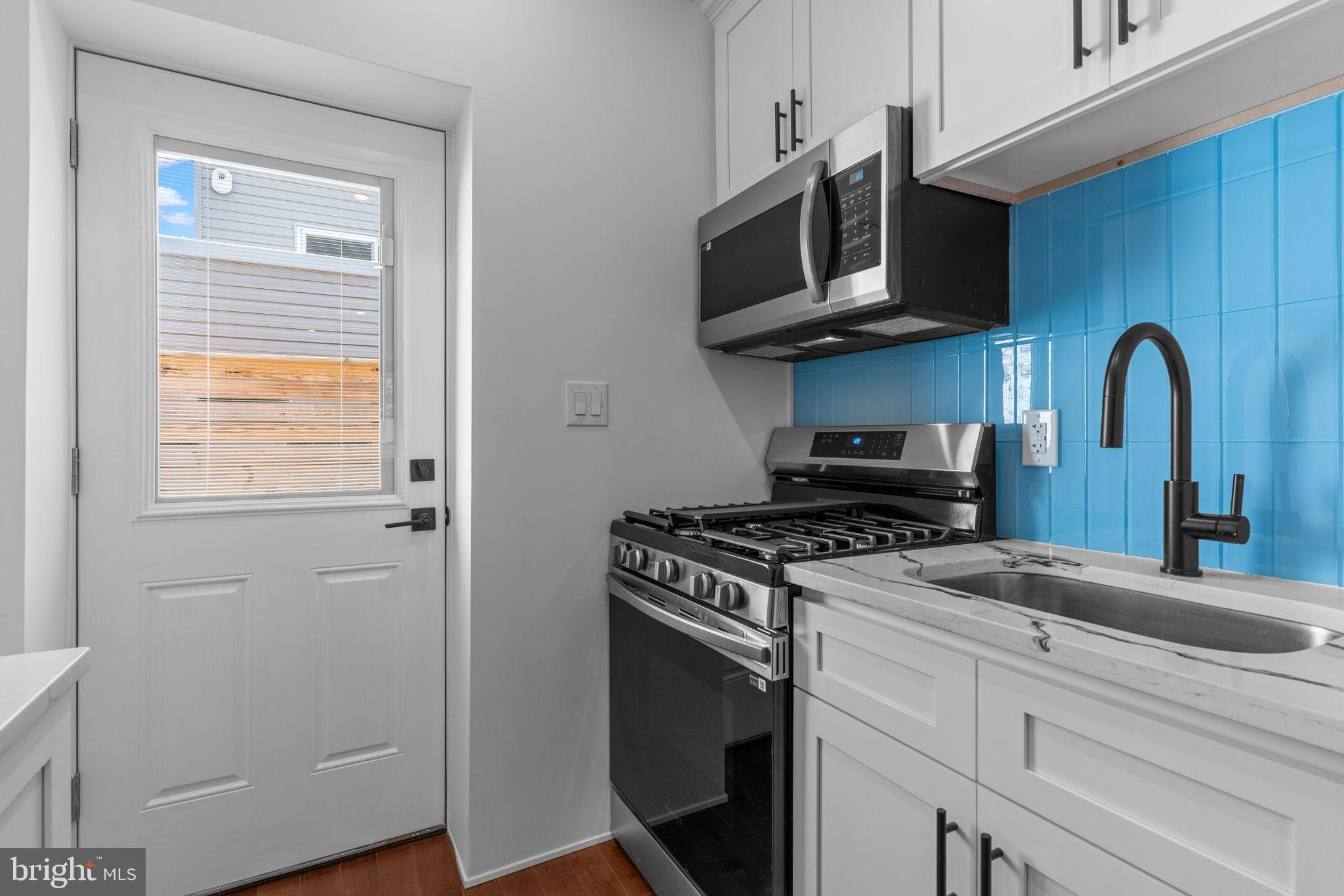 1307 Palethorp Street Philadelphia, PA 19122 - Photo 14 of 31 Bright kitchen with modern finishes.