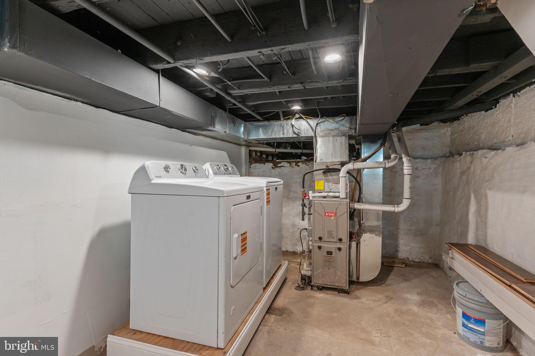 1307 Palethorp Street Philadelphia, PA 19122 - Photo 17 of 31 Functional basement laundry area with utilities.