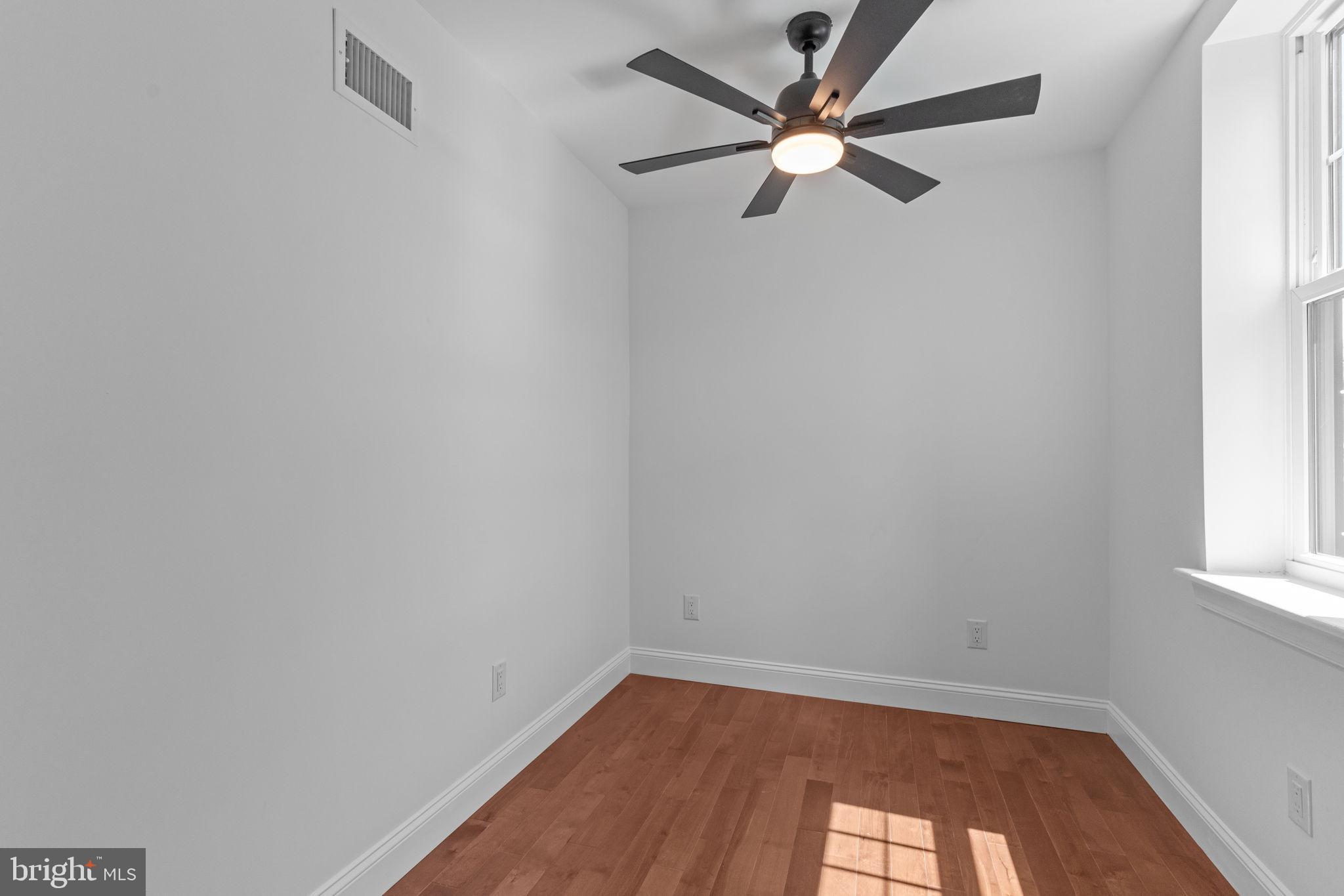 1307 Palethorp Street Philadelphia, PA 19122 - Photo 18 of 31 Bright and airy room with modern ceiling fan.