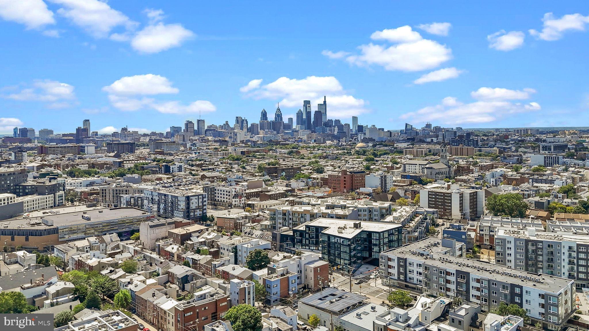 1307 Palethorp Street Philadelphia, PA 19122 - Photo 26 of 31 Vibrant cityscape under a bright sky.