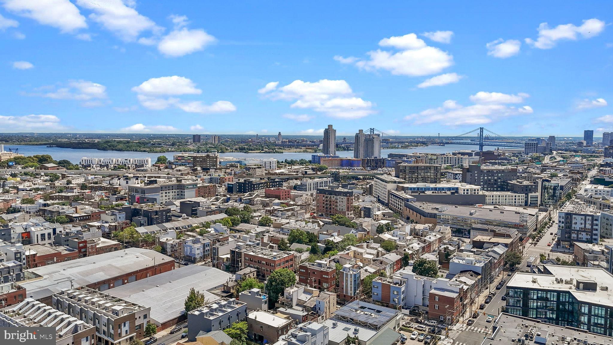 1307 Palethorp Street Philadelphia, PA 19122 - Photo 28 of 31 Vibrant cityscape under a bright blue sky.