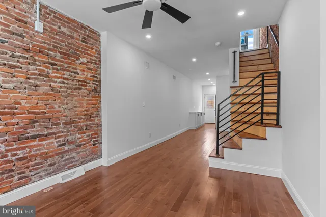 an entryway in a hall with a window