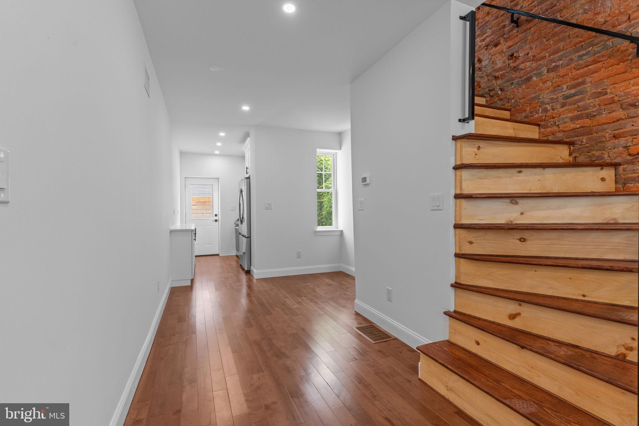 1307 Palethorp Street Philadelphia, PA 19122 - Photo 7 of 31 Inviting entryway with warm wooden accents.