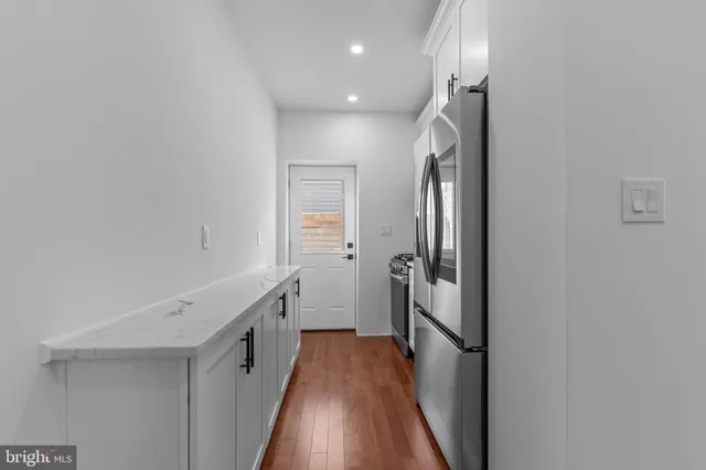 a bathroom with a sink and mirror