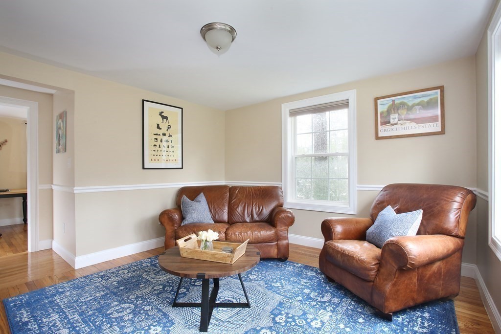 73 Moosehill Road Walpole, MA 02032 - Photo 11 of 21 a living room with furniture a window and a wooden floor