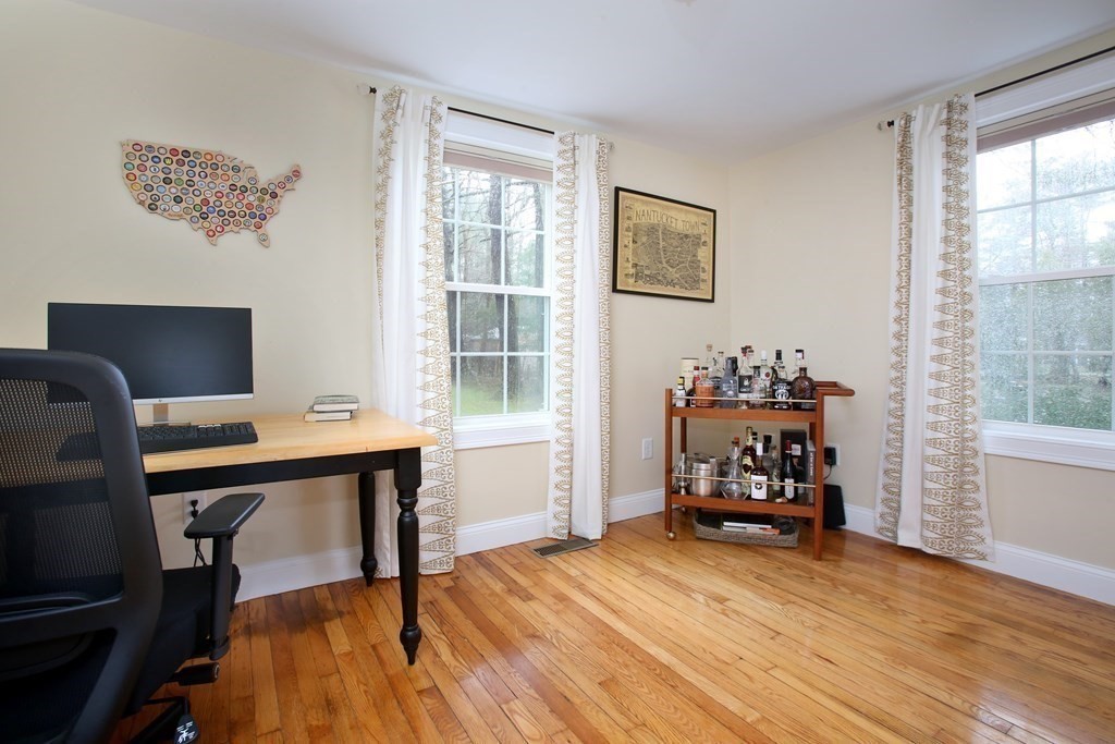 73 Moosehill Road Walpole, MA 02032 - Photo 12 of 21 a view of a workspace with furniture and a window