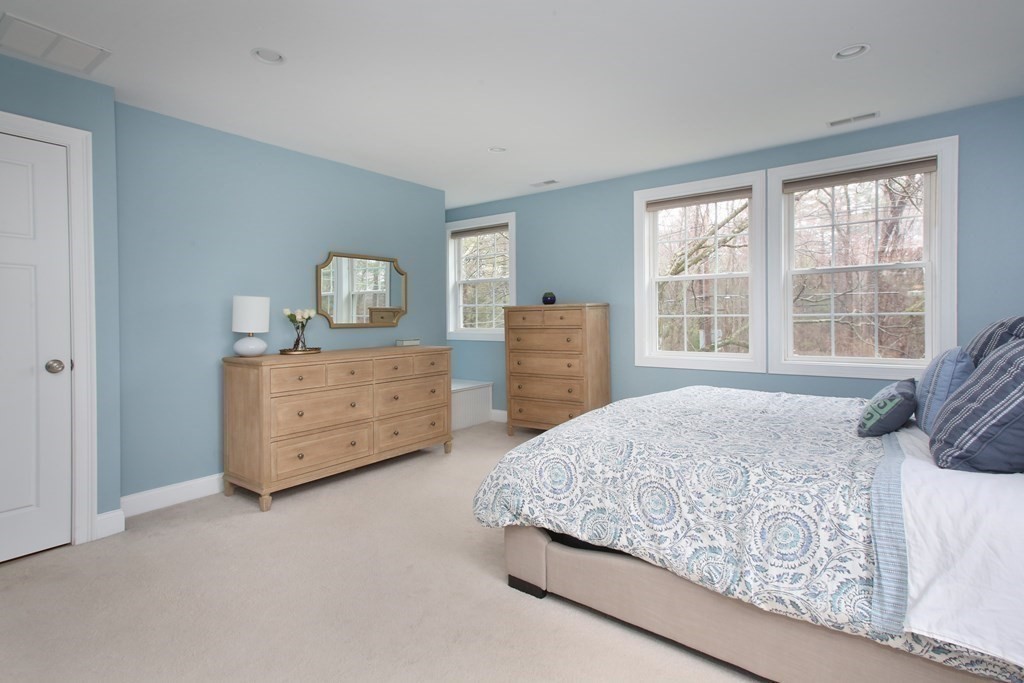 73 Moosehill Road Walpole, MA 02032 - Photo 13 of 21 a bedroom with a bed and a dresser