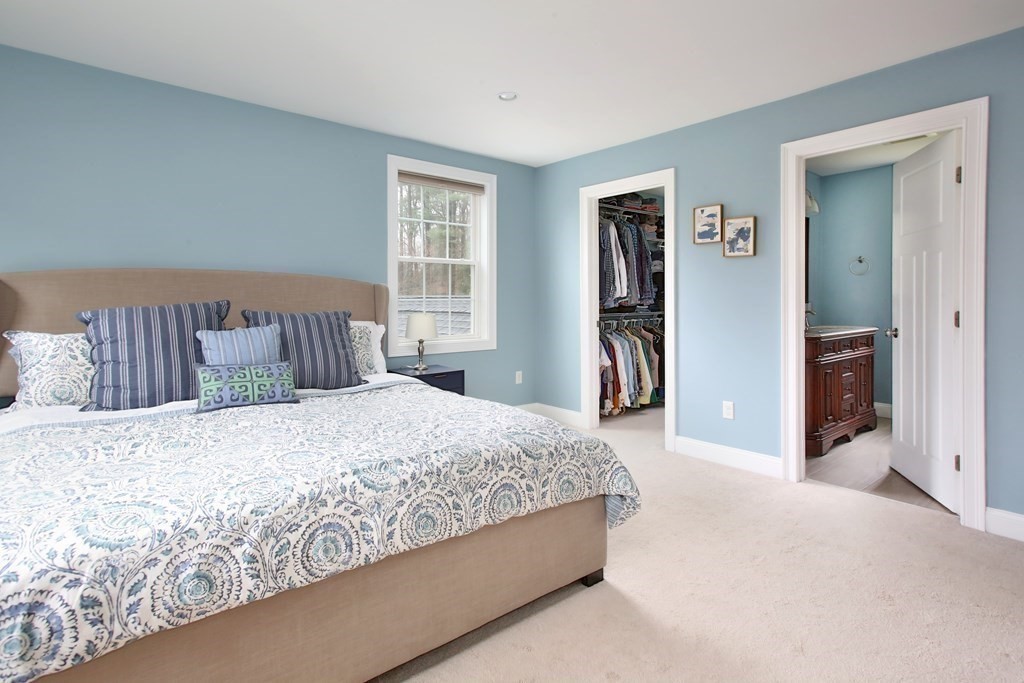 73 Moosehill Road Walpole, MA 02032 - Photo 14 of 21 a bedroom with a large bed and a closet
