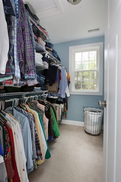 73 Moosehill Road Walpole, MA 02032 - Photo 16 of 21 a view of walk in closet with clothes and shoes