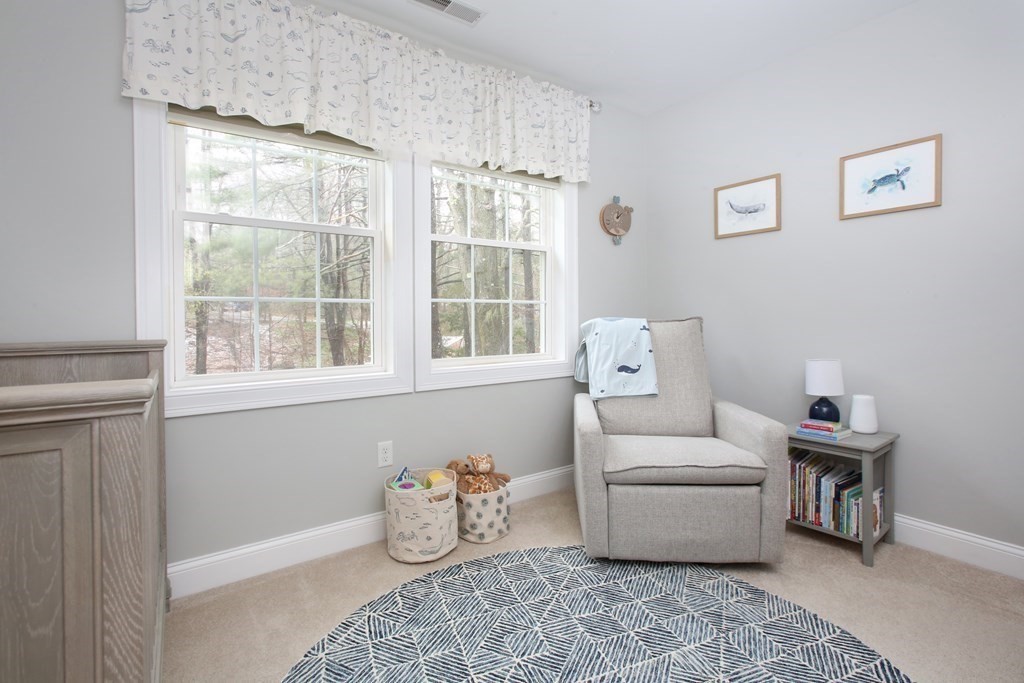 73 Moosehill Road Walpole, MA 02032 - Photo 18 of 21 a living room with furniture and a window