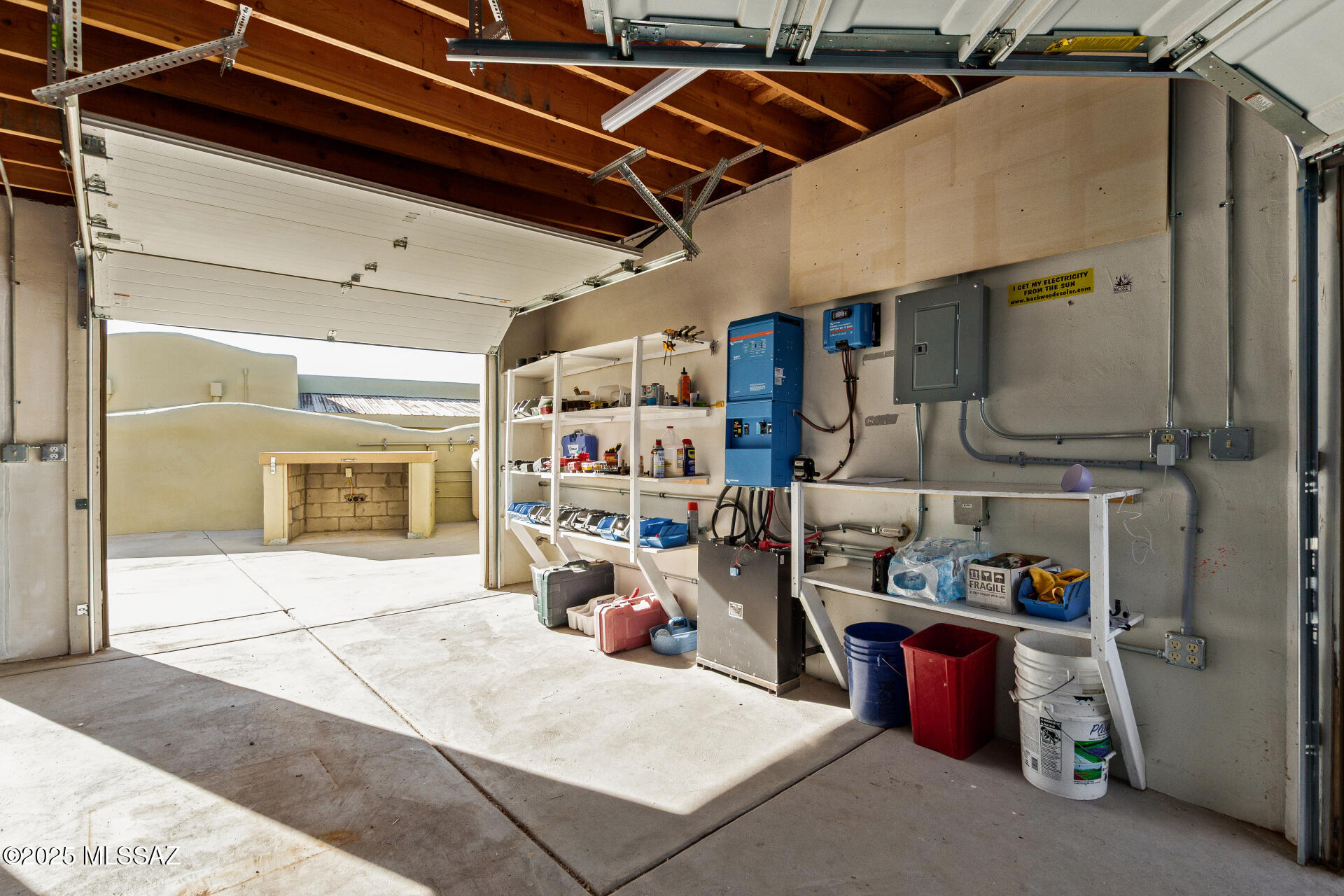 8491 South Pistol Hill Road Vail, AZ 85641 - Photo 32 of 50 Garage with solar equipment