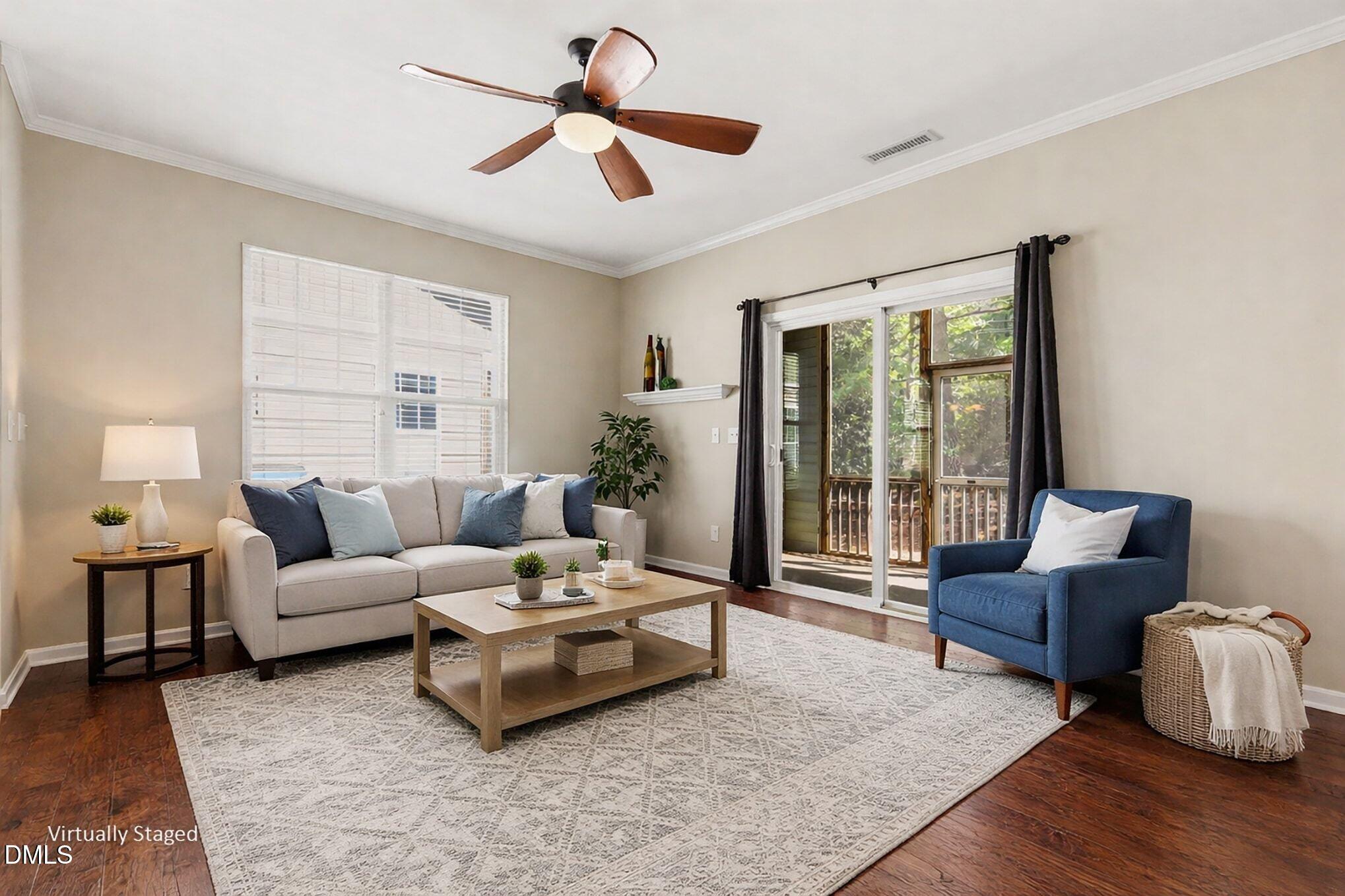 2409 Memory Ridge Drive Raleigh, NC 27606 - Photo 7 of 36 a living room with furniture and a large window