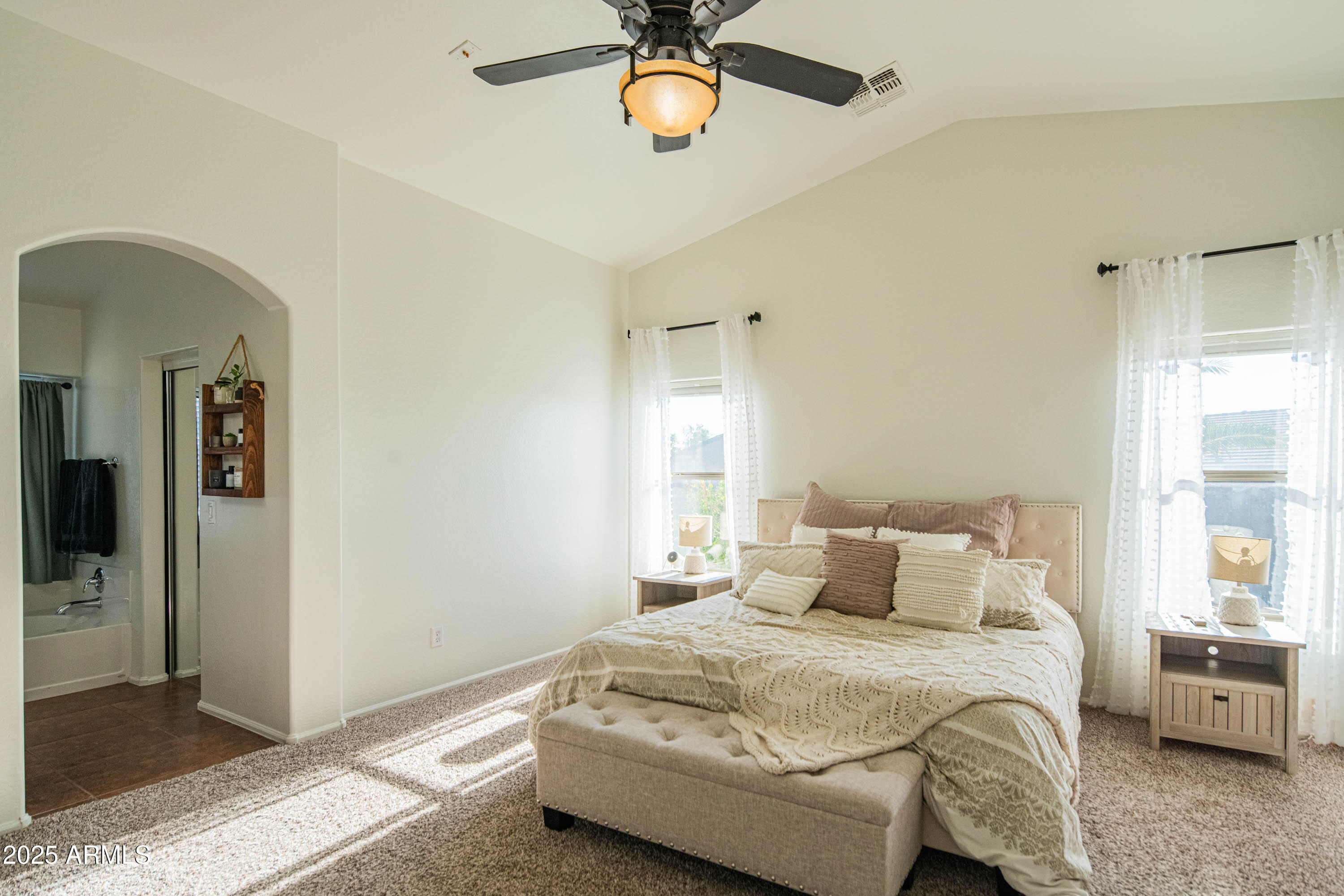 2831 East Jj Ranch Road Phoenix, AZ 85024 - Photo 15 of 32 a bedroom with a bed and window
