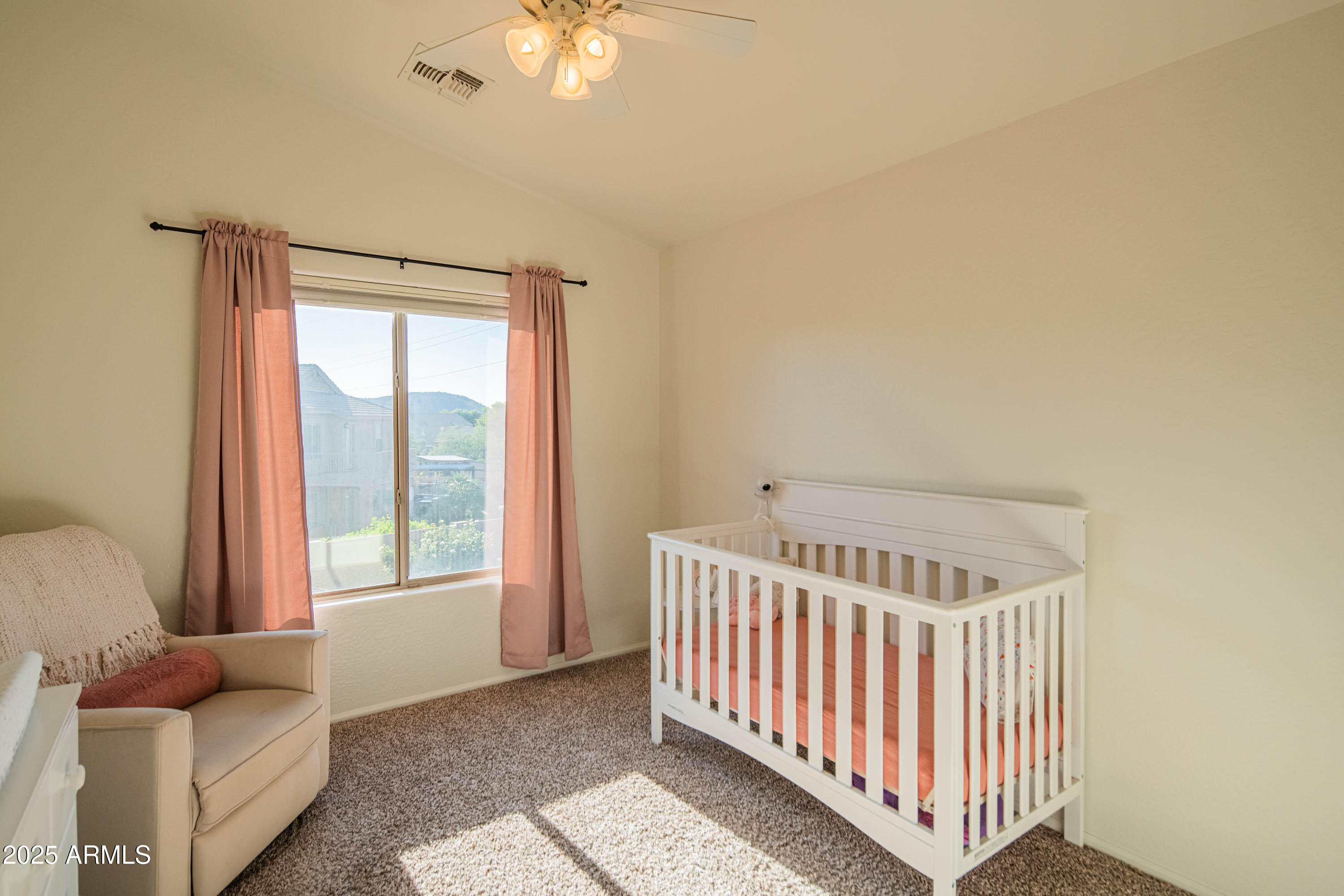2831 East Jj Ranch Road Phoenix, AZ 85024 - Photo 20 of 32 a bedroom with furniture and a window
