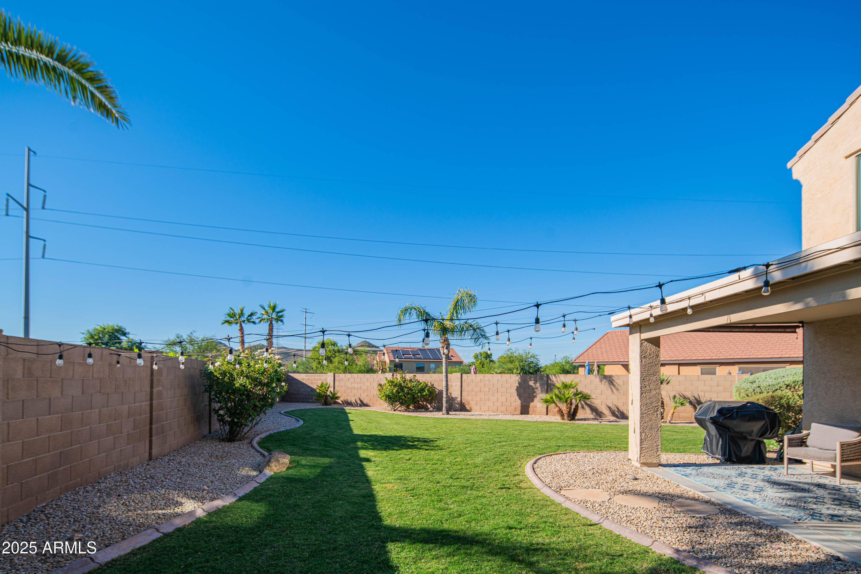 2831 East Jj Ranch Road Phoenix, AZ 85024 - Photo 25 of 32 a view of a porch with a yard