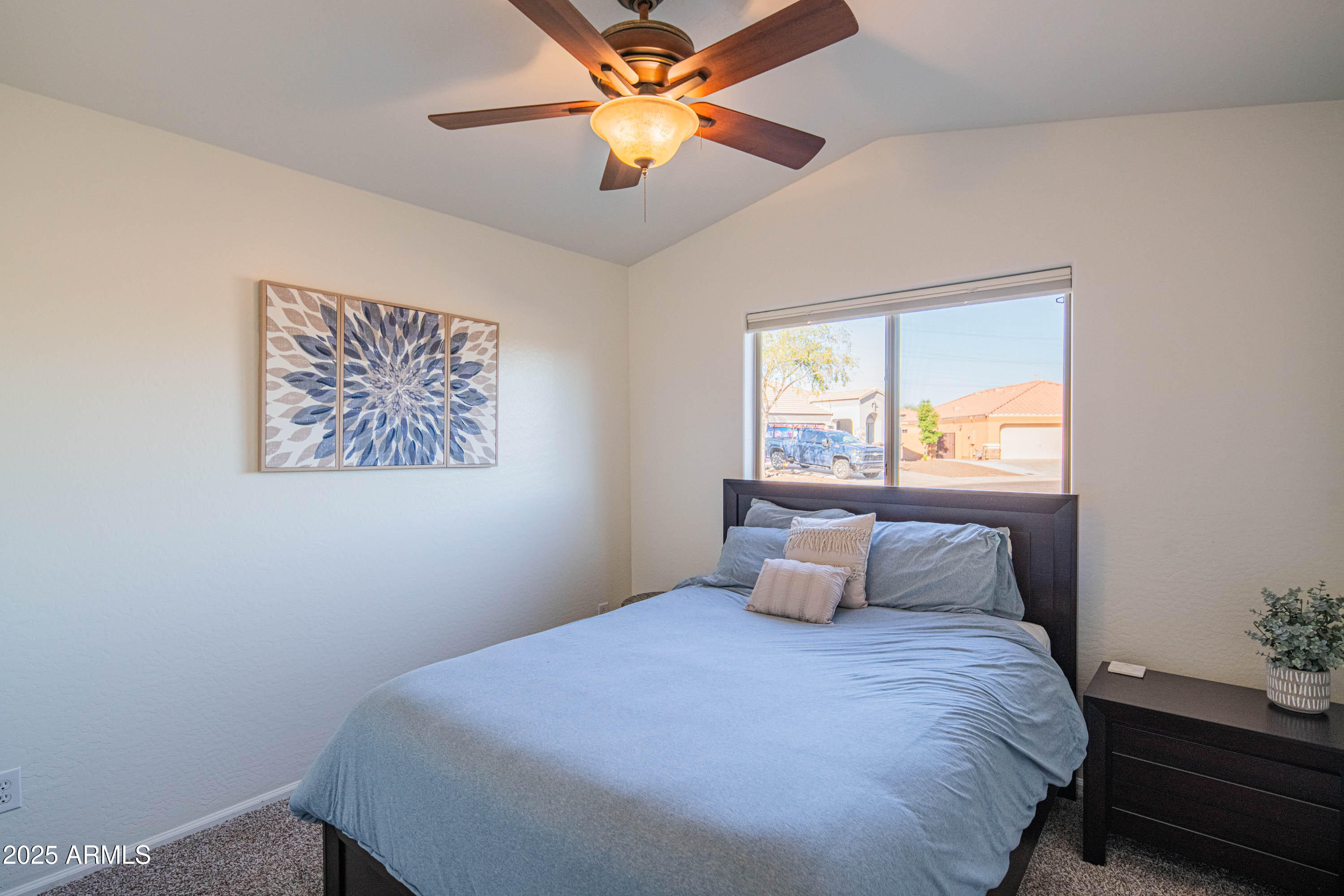 2831 East Jj Ranch Road Phoenix, AZ 85024 - Photo 8 of 32 a bedroom with a bed and window