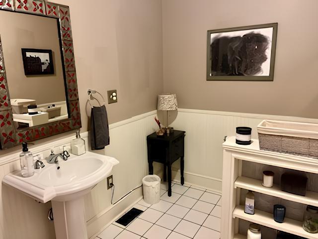 2306 Bedford Avenue Raleigh, NC 27607 - Photo 17 of 18 a bathroom with a sink and a mirror