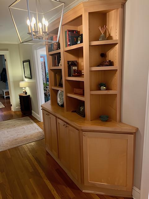 2306 Bedford Avenue Raleigh, NC 27607 - Photo 2 of 18 a room with fireplace cabinets and a table