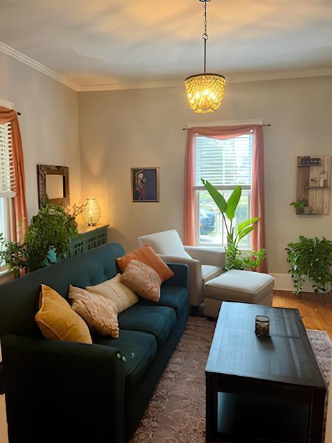 2306 Bedford Avenue Raleigh, NC 27607 - Photo 5 of 18 a living room with furniture and a lamp