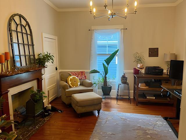 2306 Bedford Avenue Raleigh, NC 27607 - Photo 6 of 18 a living room with furniture fireplace and a window