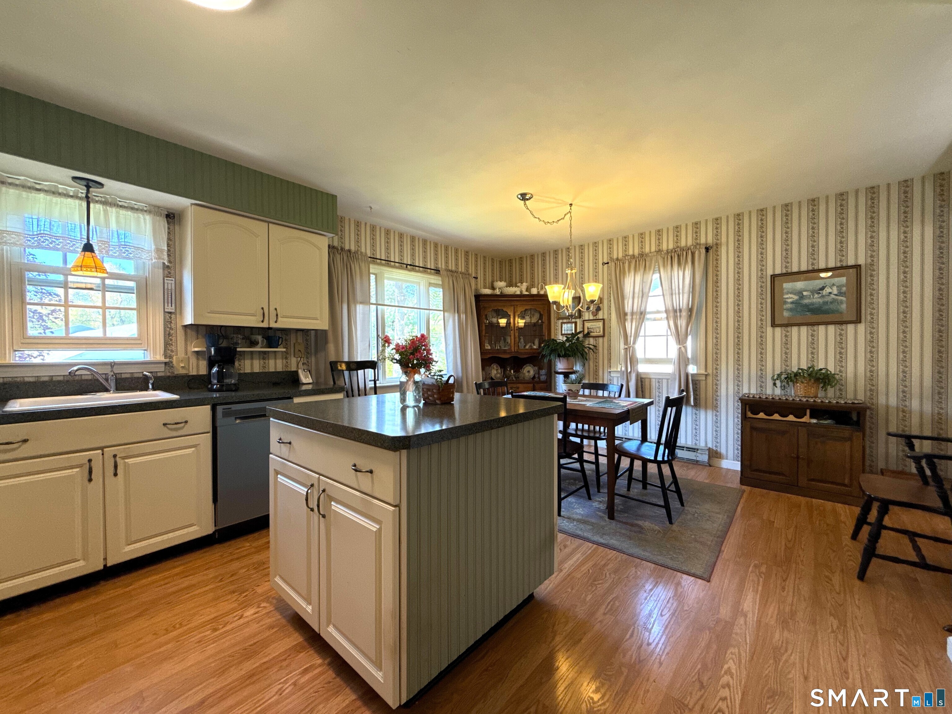 15 Grove Street Deep River, CT 06417 - Photo 7 of 25 a kitchen with stainless steel appliances granite countertop sink stove top oven and cabinets