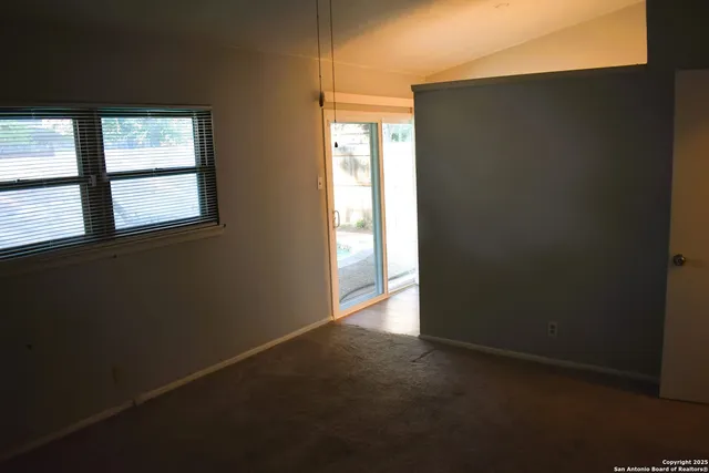 wooden view of a hallway with wooden floor
