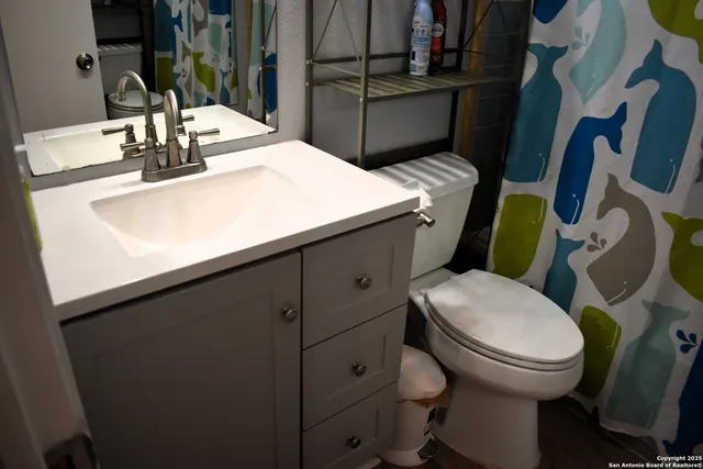 a backyard of a house with seating space