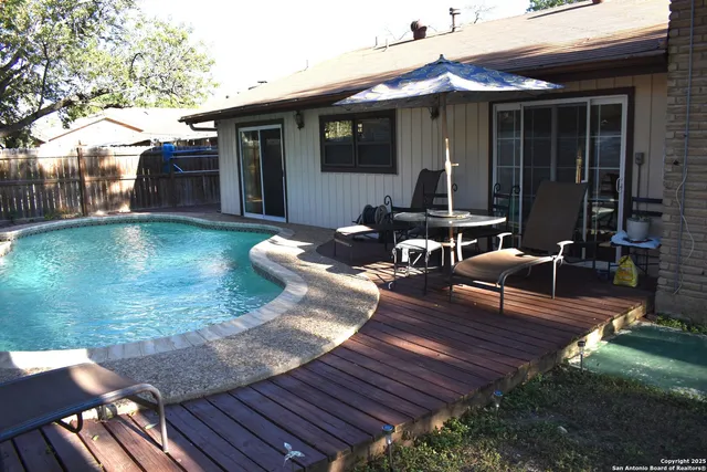 a view of a wooden floor with a sink