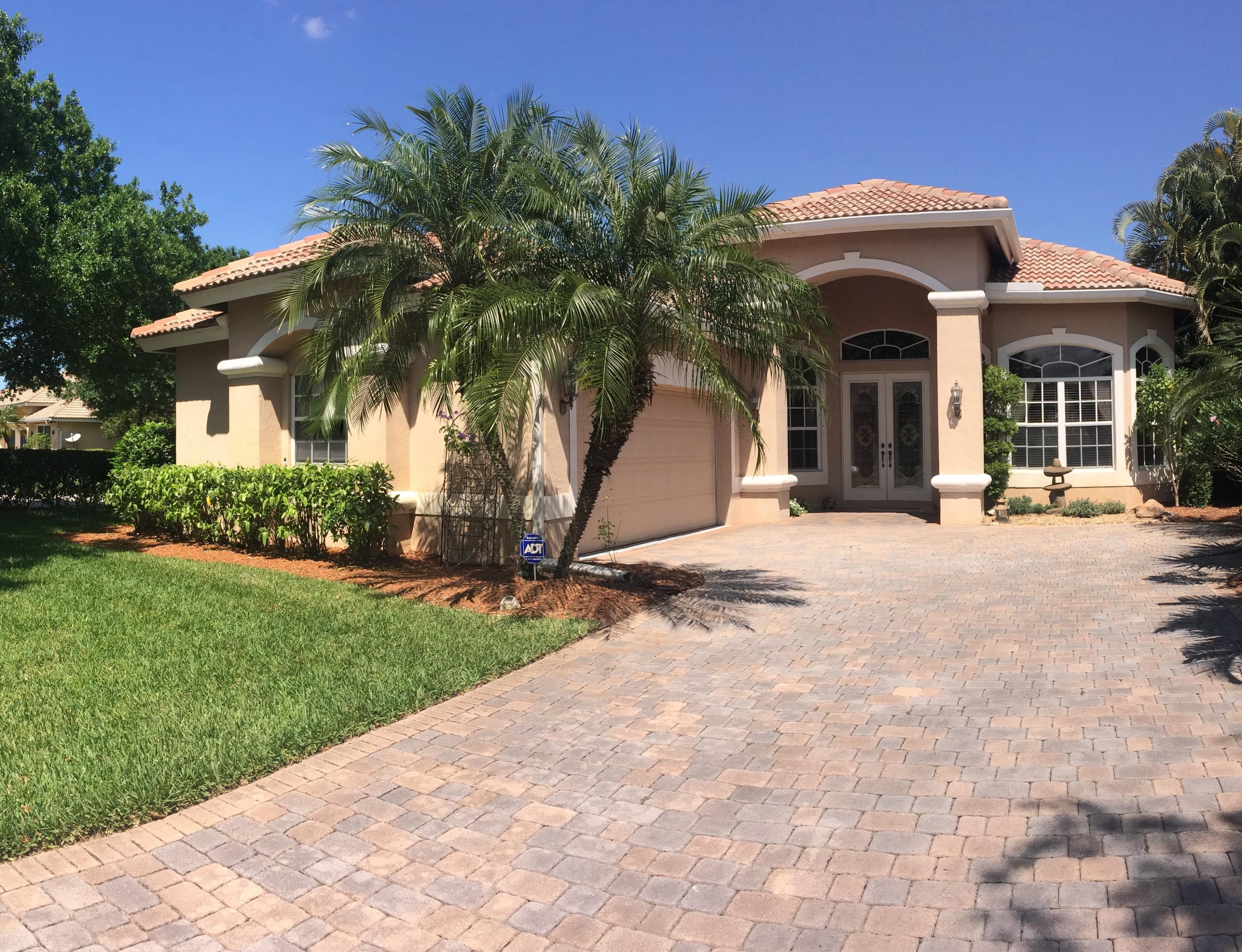8250 Riviera Way Port St. Lucie, FL 34986 - Photo 1 of 26 Front