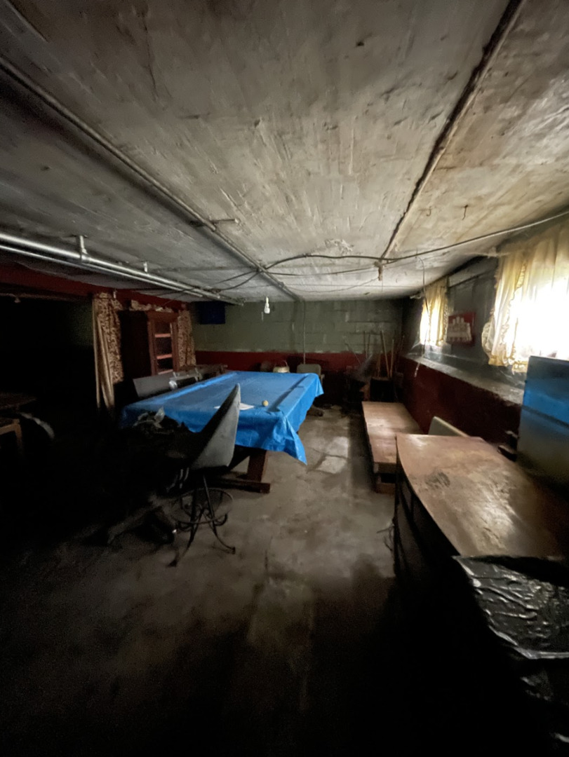 11548 South Normal Avenue Chicago, IL 60628 - Photo 13 of 14 a room with furniture