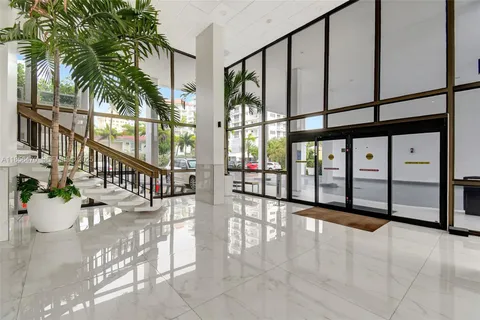 a view of staircase with lots of white walls