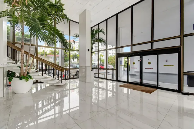 a view of staircase with lots of white walls