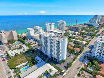 a view of balcony with furniture
