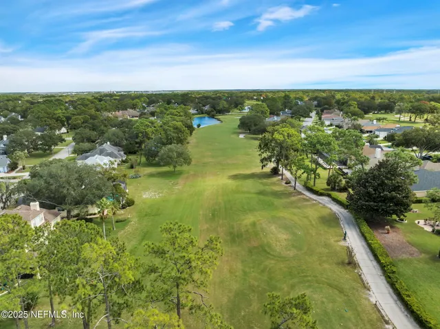 a view of a lake with a city