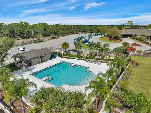 a view of a lake with a yard