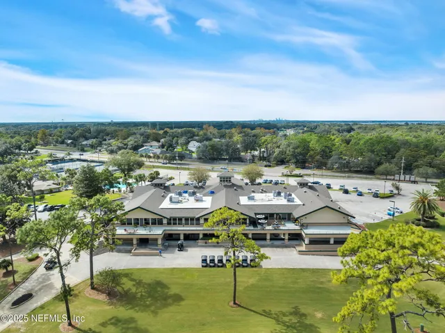 a view of multiple houses with outdoor space