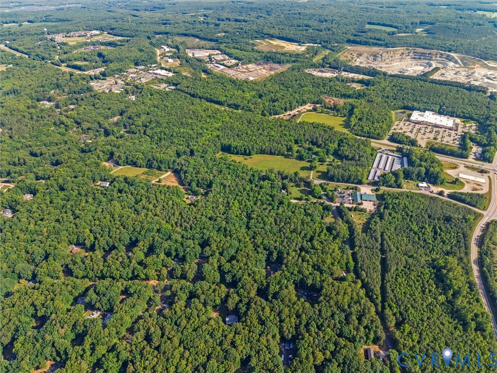 1977 Urbine Road Powhatan, VA 23139 - Photo 3 of 4 Expansive aerial perspective showcasing a vast woo