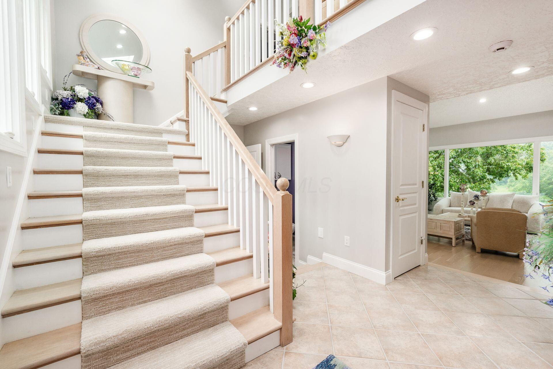 236 Tom Corwin Road Wellston, OH 45692 - Photo 34 of 104 STAIRS LEADING TO UPPER LEVEL