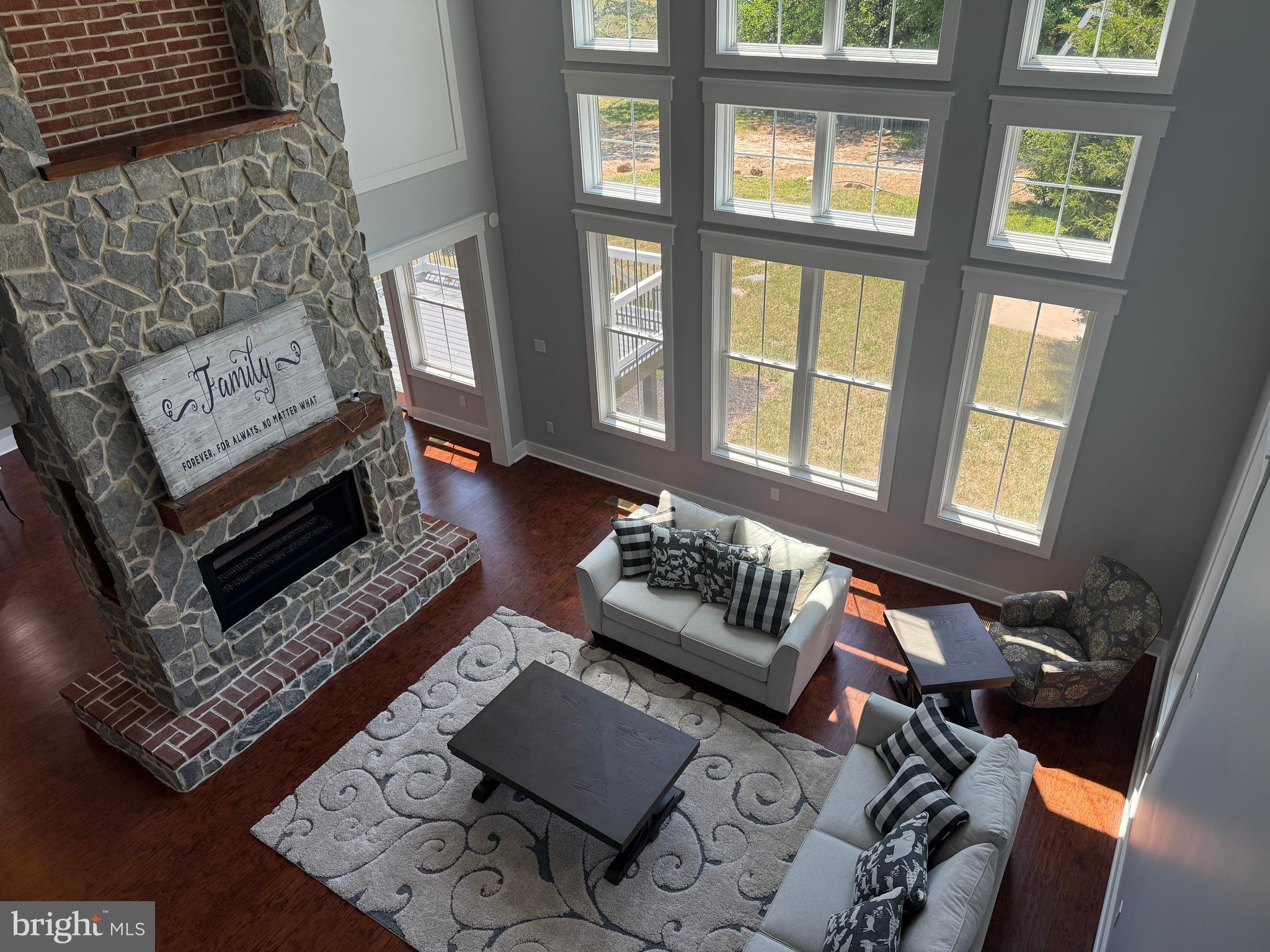 5482 Summit Bridge Road Townsend, DE 19734 - Photo 4 of 43 a living room with furniture and a fireplace