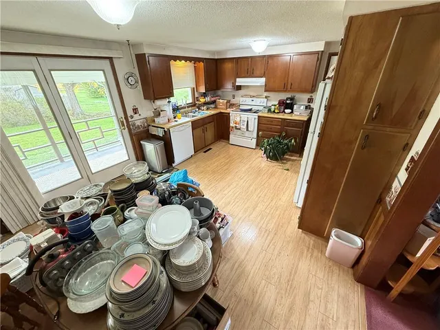 a workspace with furniture and a window