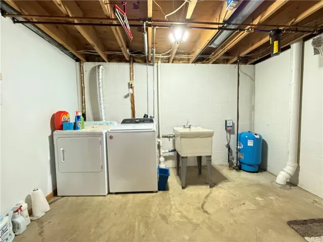 a building outdoor space with patio furniture and windows