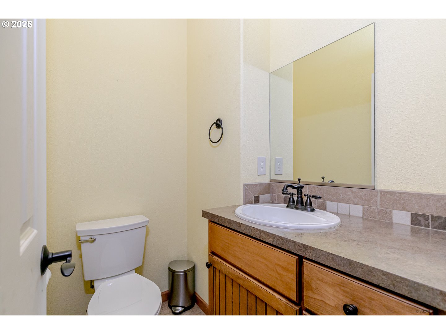 64636 Mc Intyre Road Rhododendron, OR 97049 - Photo 33 of 48 a bathroom with a granite countertop toilet sink and mirror